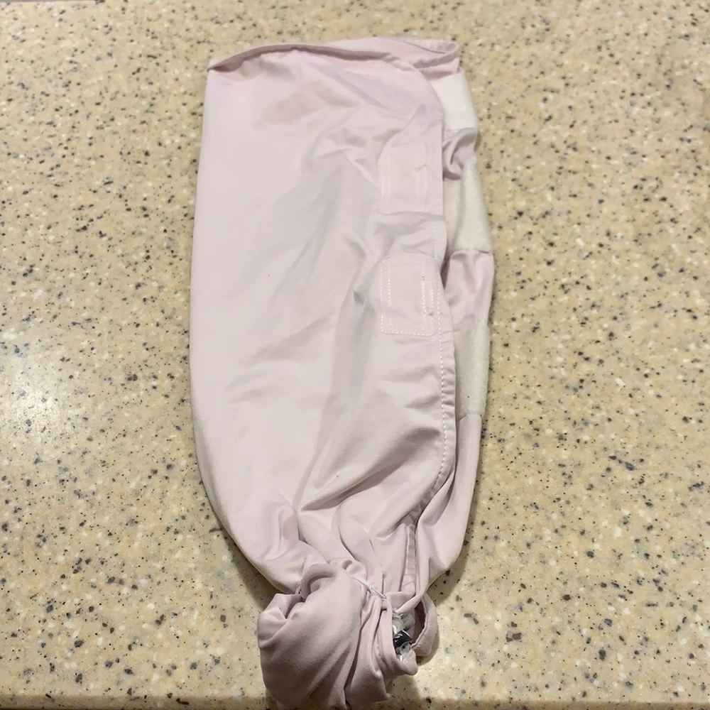 Ollie swaddle, lavender color.